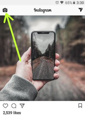 Tap camera icon at top left side corner in Instagram app